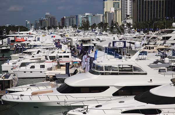 Miami Yacht Show cruising across bay from Miami Beach